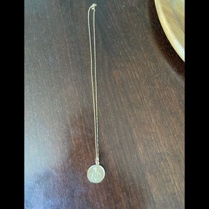 18k gold virgin mother and Jesus pendant and chain. 2.53 grams